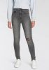 Levi's Mile high waist skinny jeans in lyocellblend met ripped details online kopen